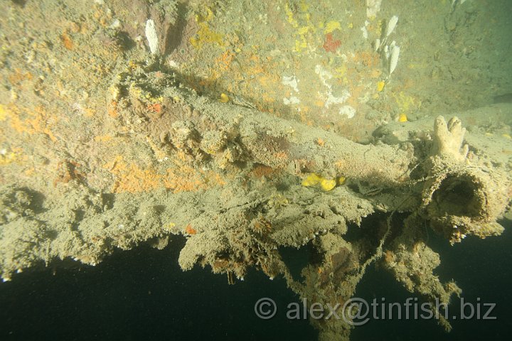 HMS_Exeter-092.JPG - Spent shell cases litter the deck from the intense fighting