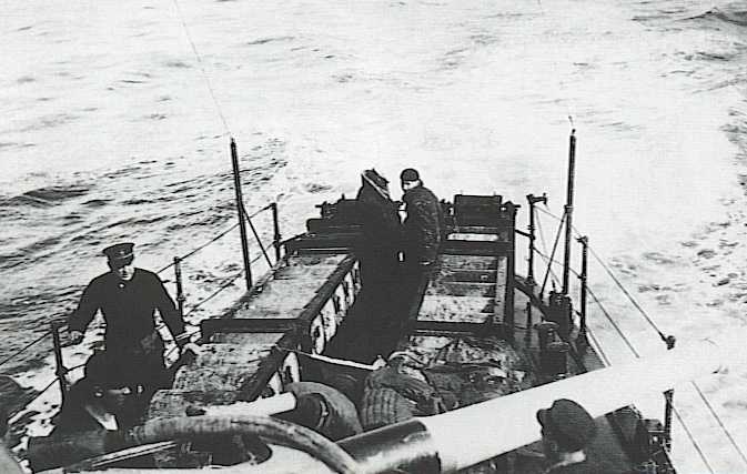 Depth_Charge_Rack-2.jpg - Depth charges rolled off the back