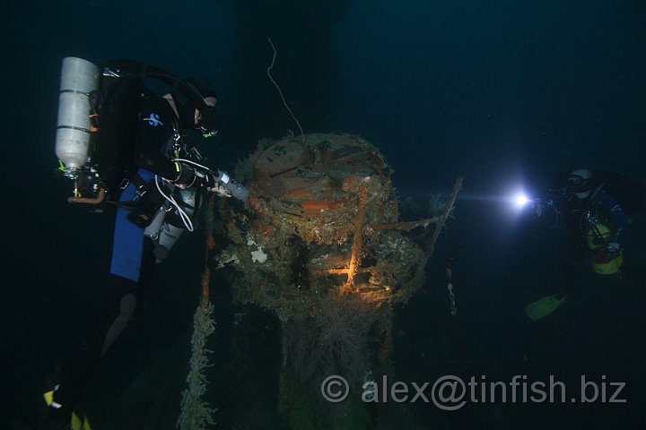 USS_Aaron_Ward-254.JPG - Chirs and Matt inspect the search light