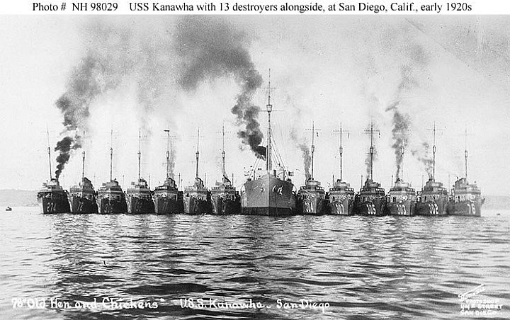 kanawha-photo1.jpg - USS Kanawha (AO-1) with thirteen destroyers alongside, off San Diego, CA., during the early 1920s.